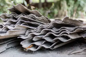 Asbestos roof tiles